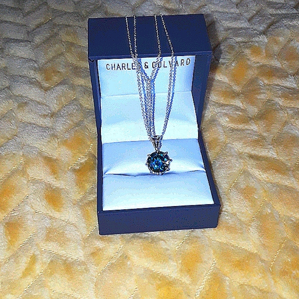 5 carat real blue diamond mounted in 925 silver.